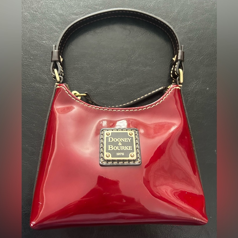 Vintage Dooney & Bourke burgundy red patent leather mini Bitsy bag. Like new!